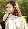 Brunette Carrying Dry Cleaning Bag Over Shoulder